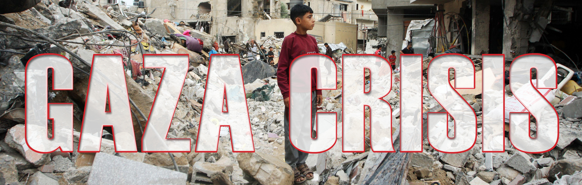 Palestinian boy looks at his demolished home in Gaza, October, 2023